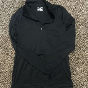 Loose long sleeve black Under Armour shirt. Size medium never worn.